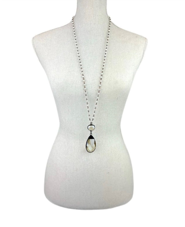 Crystal Teardrop Pendant on Pearl Necklace